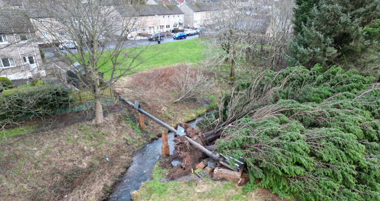 The damaged pipe bridge runs over Bilston Burn in Bilston Park Bilston Burn Sewer Pipe Bridge Repair