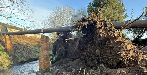 Scaffolding will carry a temporary pipe over the burn Bilston Burn Sewer Pipe Bridge Repair