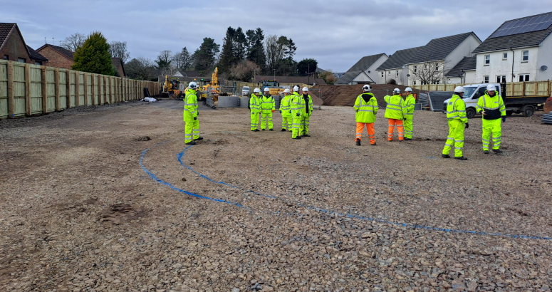 The outline of the new storm tank has been marked in blue paint Stewarton Flood Alleviation