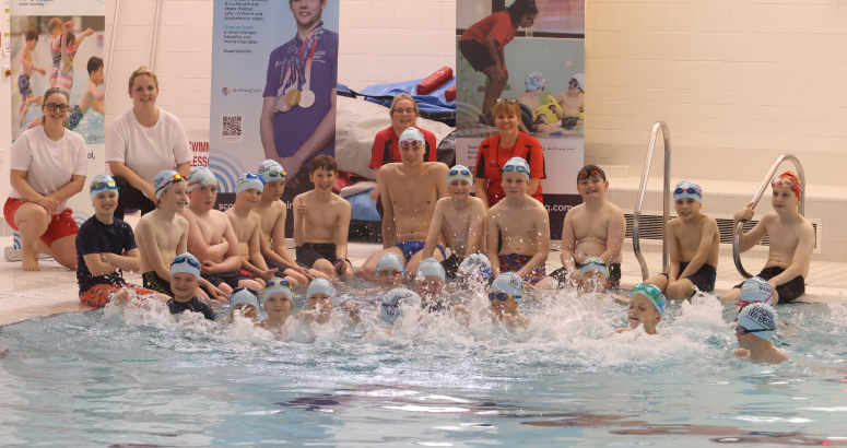Duncan Scott taking part in a Learn to Swim session with youngsters at the Pickaquoy Centre in Kirkwall