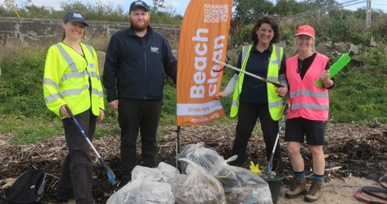 Scottish Water employees taking part in the great british beach clean
