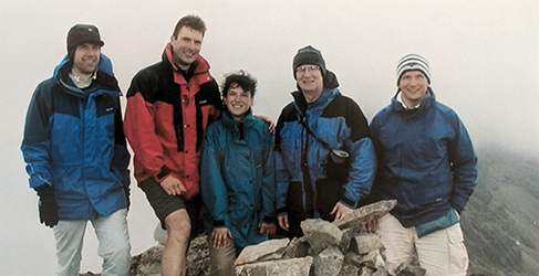 WaterAid at 30 historic image of Mountaineer Tom Millar with a group on a summit for the Skye Munro Challenge