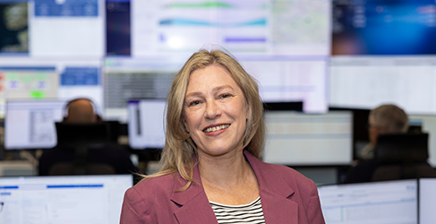 Cab Sec Gilian Martin visit to ICC Acting Cabinet Secretary for Net Zero and Energy in the Intelligent Network Control Room with bank of digital screens