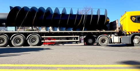 The screw pump is shown securely fastened in place on a wagon The screw pump is shown securely fastened in place on a wagon